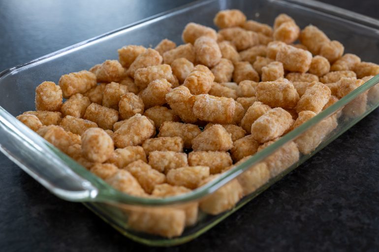 Tater tots in a casserole dish