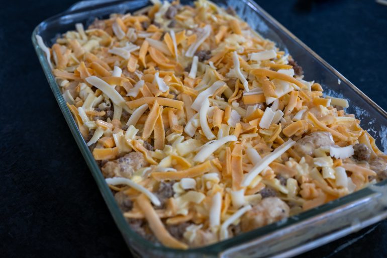 An uncooked sausage, egg, and cheese casserole.