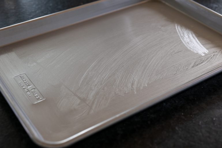 A greased jelly roll pan.